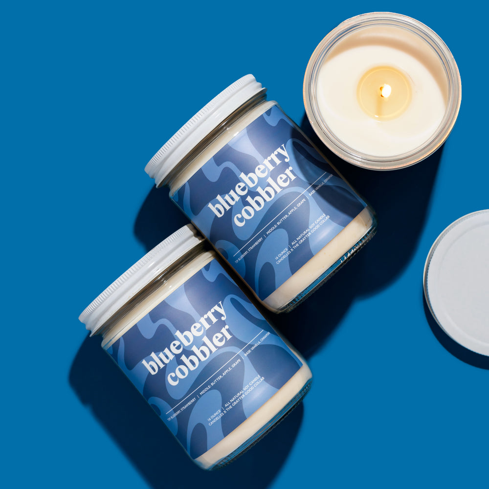 
            
                Load image into Gallery viewer, The Grayter Good x Candelles Blueberry Cobbler Soy Candle - Standard
            
        